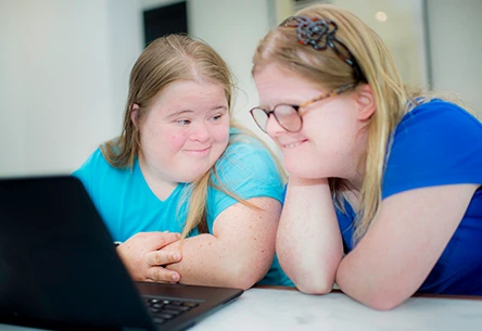 friendship ebuddies program two ebuddies participants at a computer